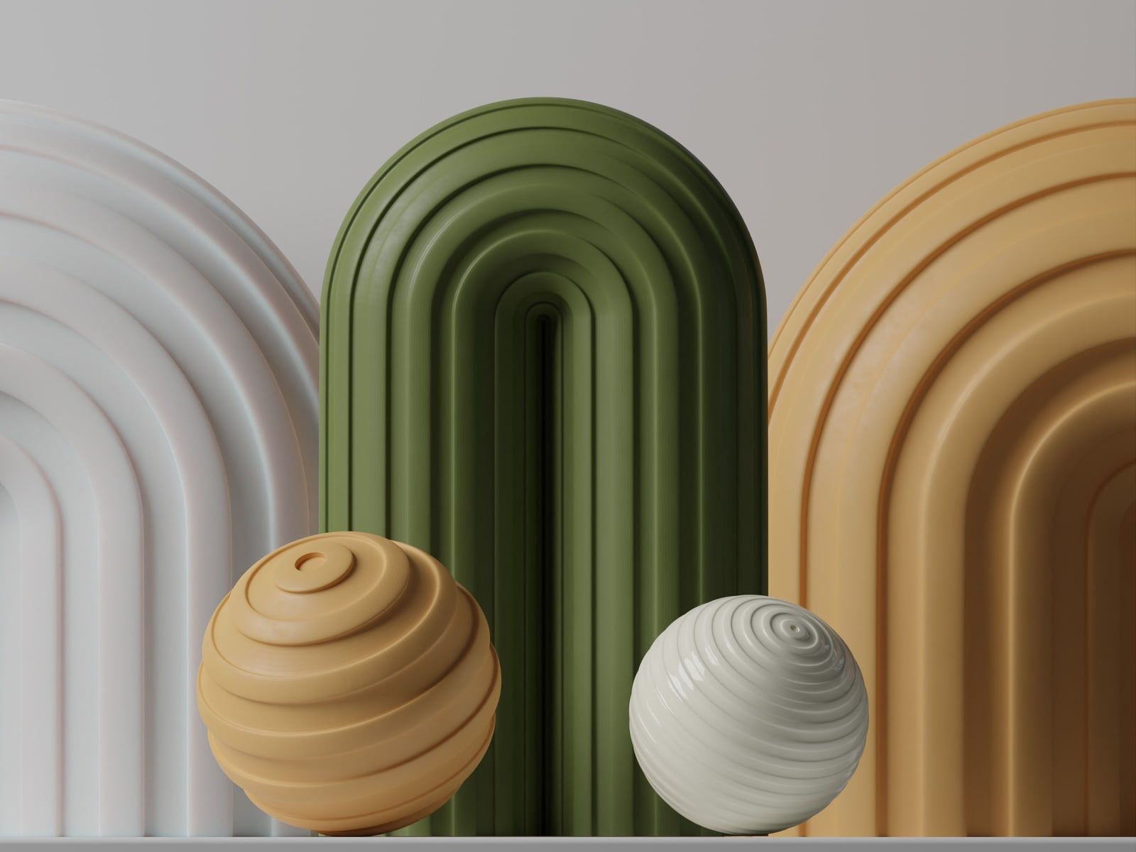 3D-geprinte decoratieve bogen en bollen met ribbelstructuur in wit, groen en okergeel